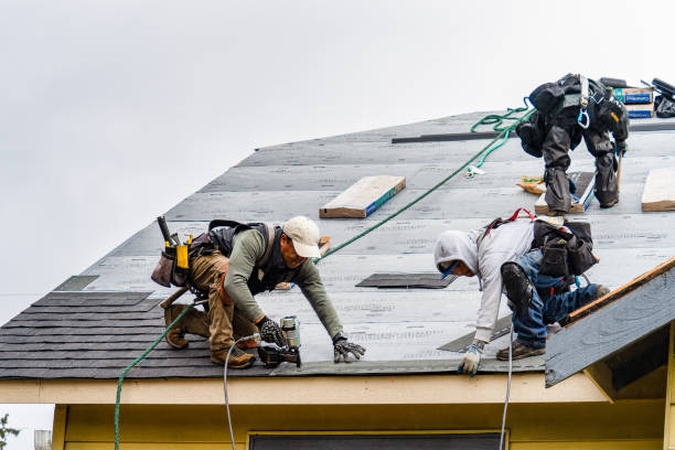 Professional Gutter Installation technician working in Paupack, PA